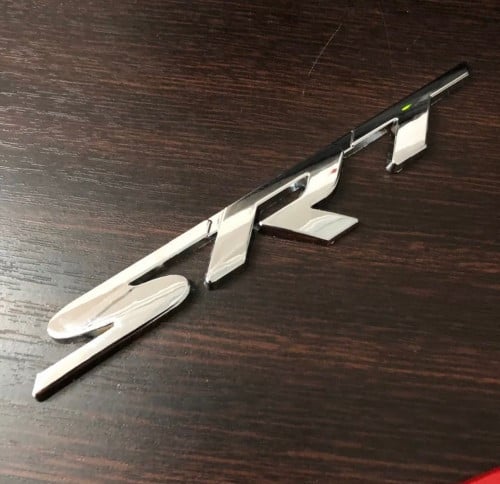 SRT badges on the front grille or trunk