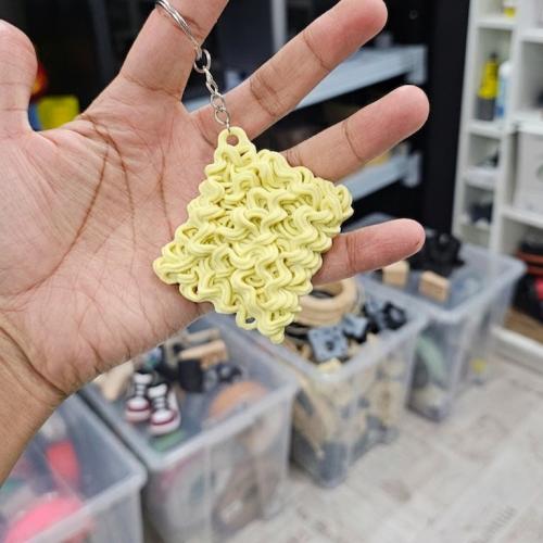 ميدالية اندومي indomie noodles keychain