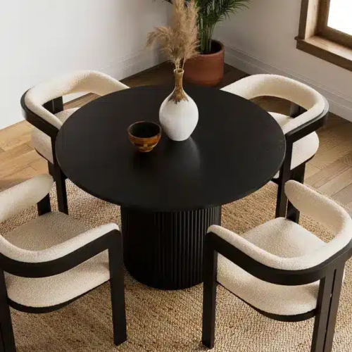 طاولة طعام دائرية مع 4 كراسي بتصميم مودرن أنيق"