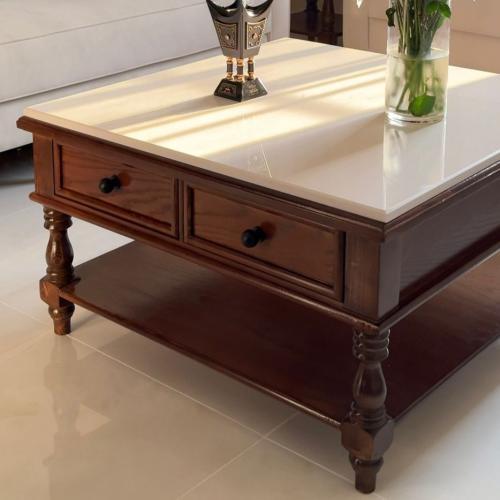 A classic-style coffee table characterized by its marble top and wooden frame