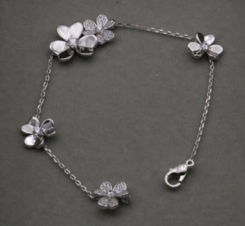 اسوارة فان كليف فريفول 5 زهرات فضي أبيض مرصع ميني