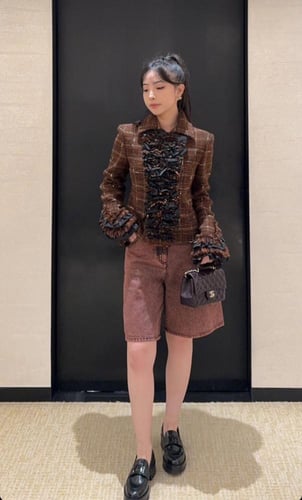 2024 شورت برمودا شانيل دينم باهت برتقالي أسود