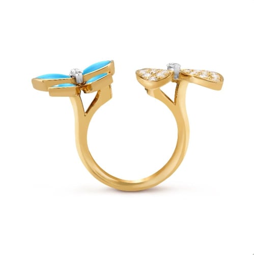 خاتم فان كليف تو باترفلاي بين الأصابع ذهبي تركوازي