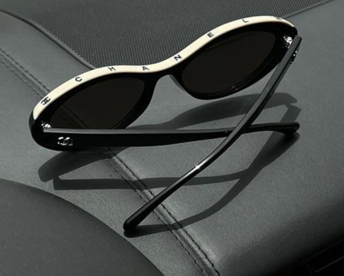 2024 نظارة شانيل شمسية بإطار بيضاوي أبيض بحروف شان...