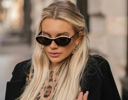 2024 نظارة شانيل شمسية بإطار بيضاوي أبيض بحروف شان...