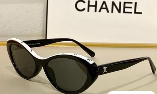 2024 نظارة شانيل شمسية بإطار بيضاوي أبيض بحروف شان...