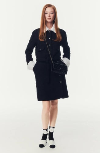 2025 تنورة شانيل تويد أسود أبيض