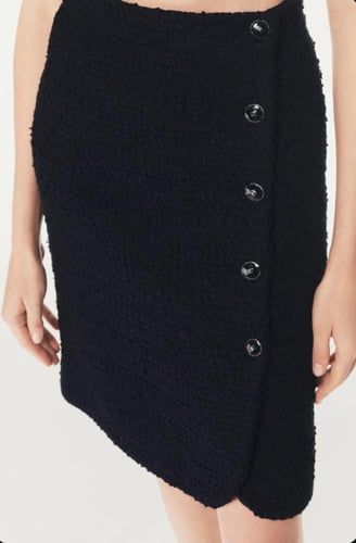 2025 تنورة شانيل تويد أسود أبيض