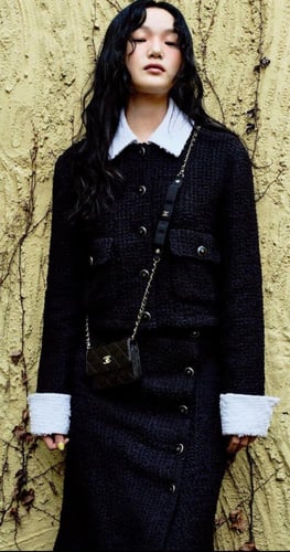 2025 تنورة شانيل تويد أسود أبيض