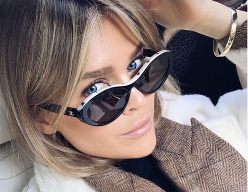 2024 نظارة شانيل شمسية بإطار بيضاوي أبيض بحروف شان...