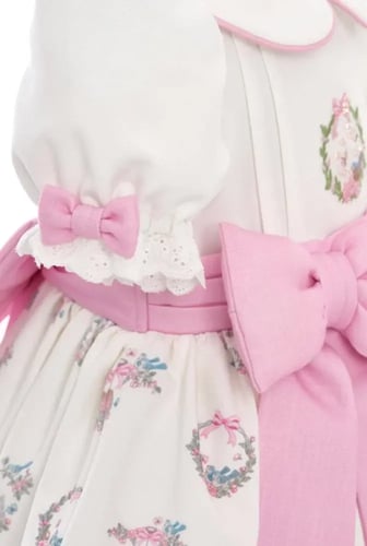 فستان مواليد مع ربطه شعر