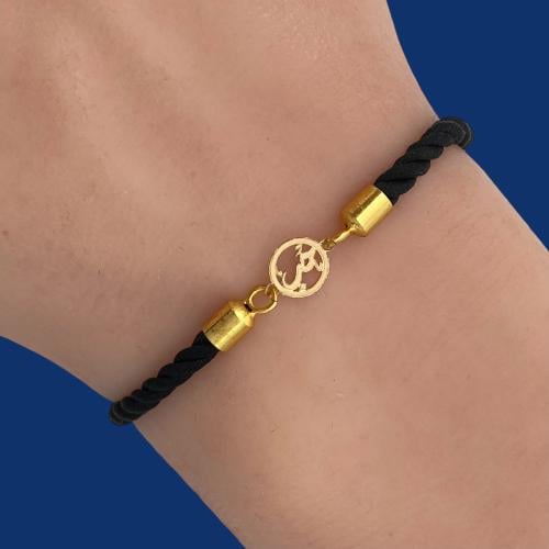 18-karat gold cord bracelet weighing 0.05 grams wi...