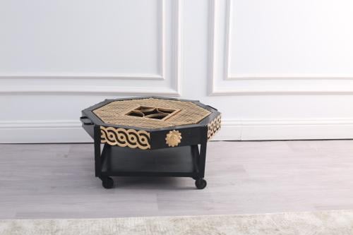 منقل حطب دائري ديكور حديد لون اسود وذهبي