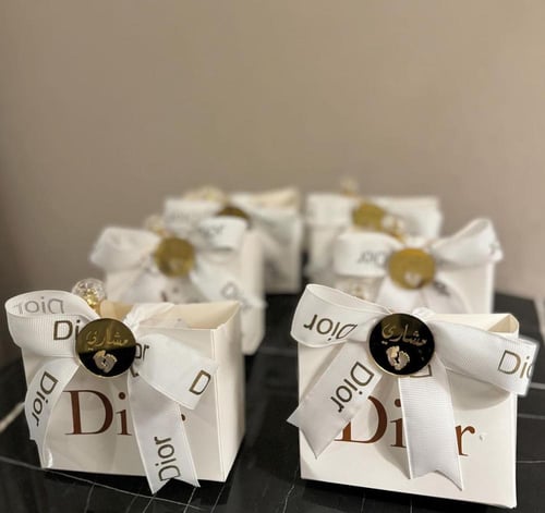 توزيعات اكياس ديور مع شرايط مع عطور جادور من ديور...