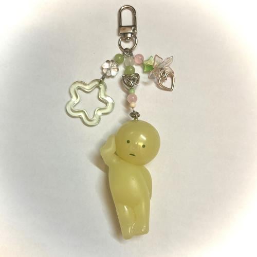 Smiski laying down keychain