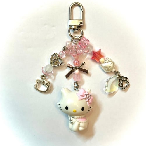 Pink gotochi keychains