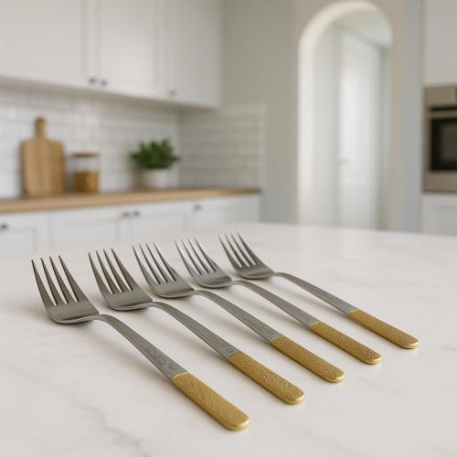 طقم شوك طعام استيل بمقبض مزخرف ذهبي