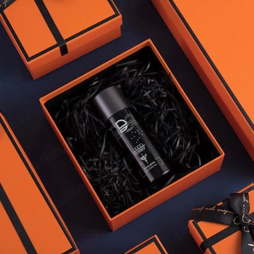 طقم علب هدايا فاخرة برتقالية مزينة بشريط أسود – تص...