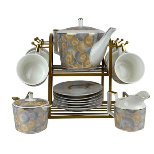 طقم شاي بورسلان فاخر بنقشة دائرية مع حامل معدني ذه...