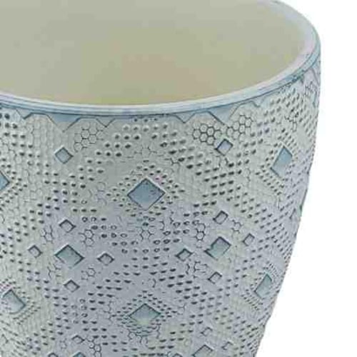 أصيص سيراميك مزخرف بنقوش هندسية بارزة