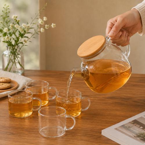 طقم شاي زجاجي مع غطاء خشبي و 4 أكواب
