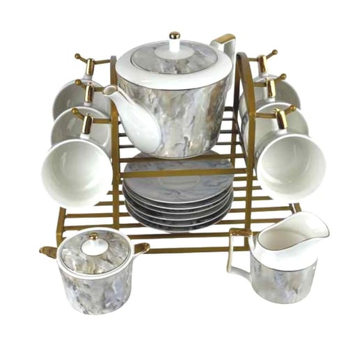 طقم شاي بورسلان بنقشة رخامية مع حامل ذهبي