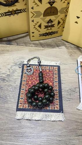 سبحة تراب كهرمان زيتي ب شكة سيفين ونخله فضه