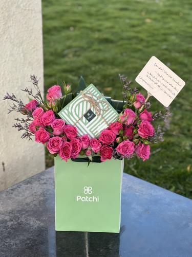 Eid gift chocolate Bateesh with flowers