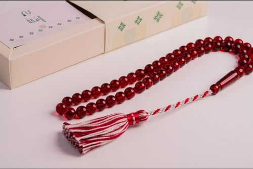 مسباح بكلايت احمر شفاف فتل حائل