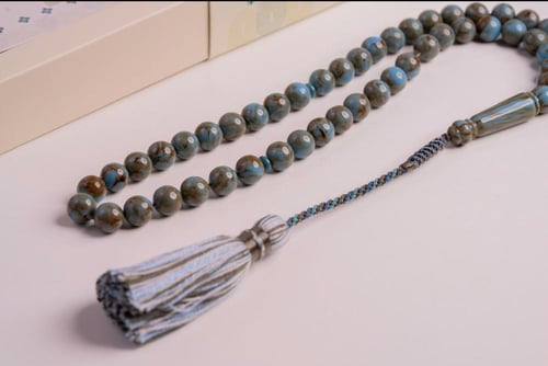 مسباح بكلايت فيروزي غامق فتل حائل