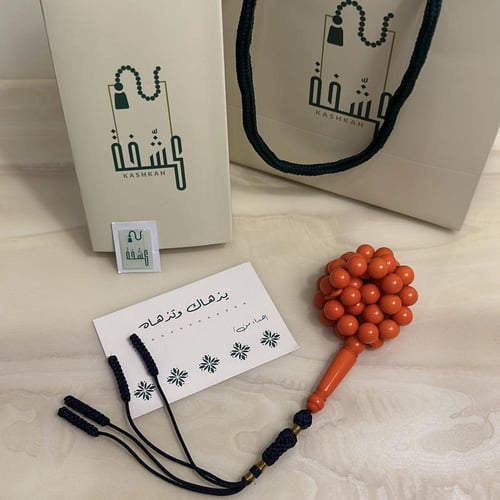 مسباح بكلايت برتقالي مع كركوشه