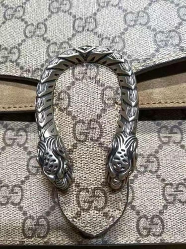 قوتشي ديونيسوس هاندل مقاس24 سم .