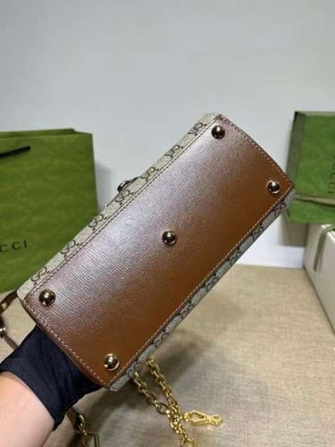 قوتشي هورسبيت هاندل مقاس22 سم .