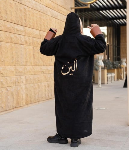 فروه اطفال بالاسم قماش جوخ مع جلد على الاطراف