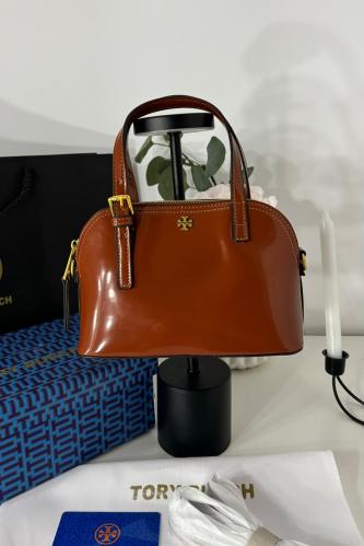 توري بورتش - بني جملي لامع