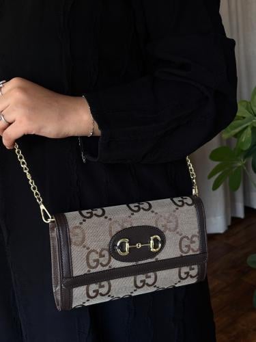 شنطه كروس قوتشي - بني غامق