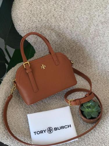 توري بورتش - بني جملي مطفي