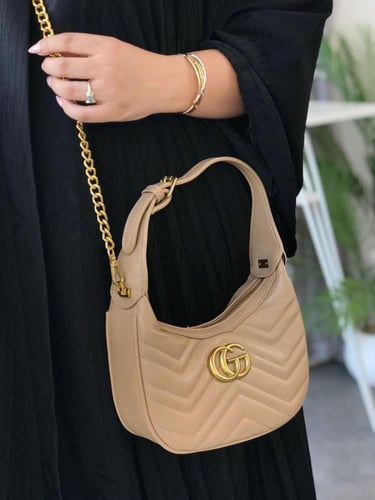 شنطة قوتشي - بيج وذهبي