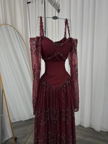 فستان سهرة مطرز كلفة