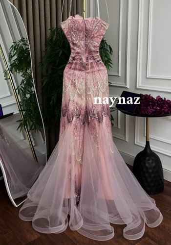 فستان سهرة تل مطرز بتصميم كلوش فاخر