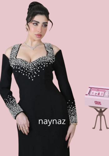 فستان سهرة مطرز بلآلئ فاخرة