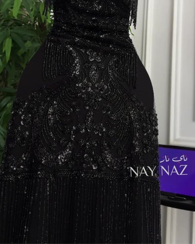 فستان سهرة كلفة تطريز خرز