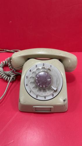 تيلفون ابوقرص عليه السيفين والنخله