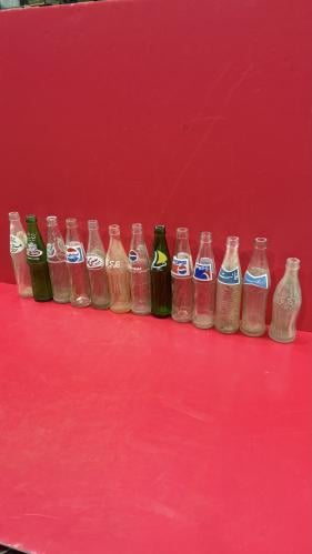 14 قاروره مختلفه مشروبات قديمه