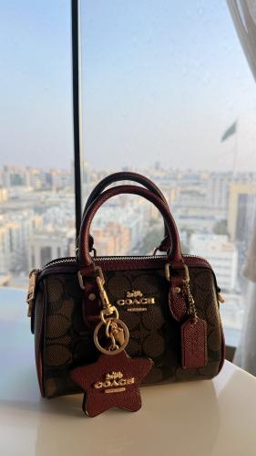 شنطة كوتش برغندي