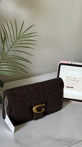 شنطة كوتش بني كبيرة