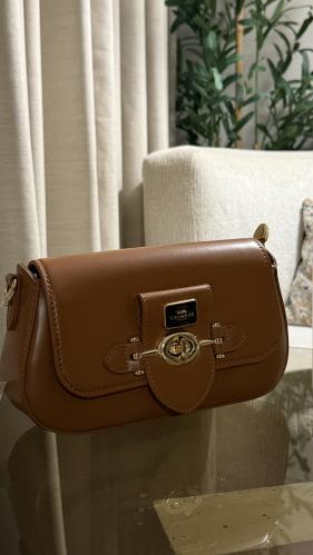 شنطة كوتش بني