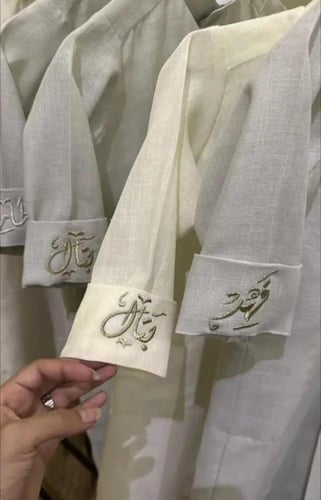 ثوب اطفال قماش لنن بتطريز اسم