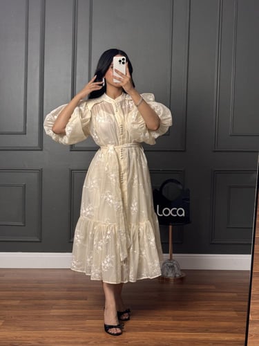 فستان ناعم ميدي لون سكري مطرز بأكمام منتفخة وحزام...