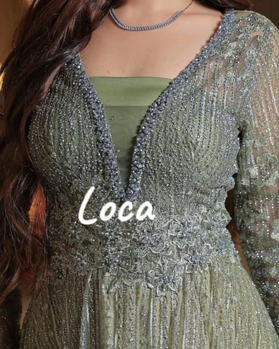 فستان سهره باكمام وتطريز مميز